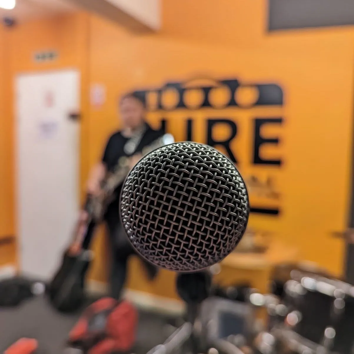 Microphone in the rehearsal room, ready for an Ekowe live performance